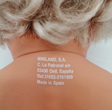 Marking on the back of a Miniland doll