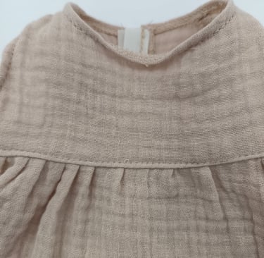 Uneven gathering and loose stitches on Minikane doll outfit