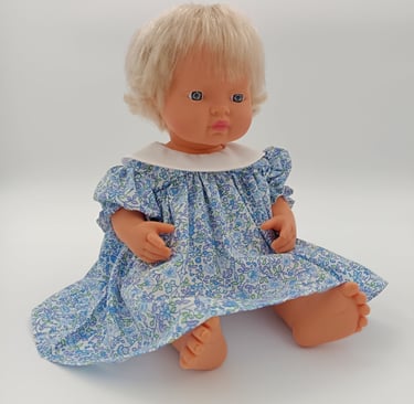 Miniland doll in dress with round collar