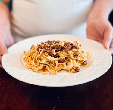 A plate of tagliatelle al ragù by Alessandra Spisni.
