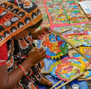 Traditional Madhubani painting on mud walls.