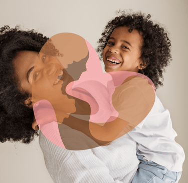 a woman holding a child in her arms