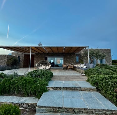View of the house and terrace in typical cycladic stone-wall fashion.