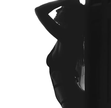 a woman in a black and white photo. boudoir photography
