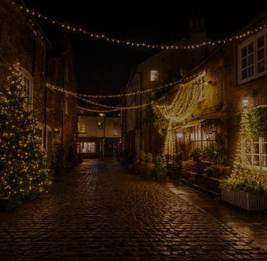 Slow living journal scene of a street decorated with christmas lights at night