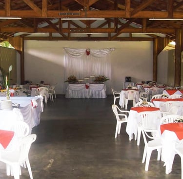 a large room with tables and chairs and tables