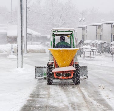 a man cleaning snow