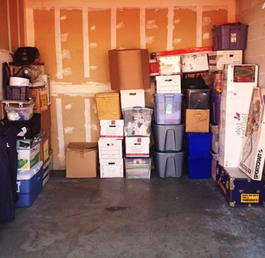 junk piled in storage unit