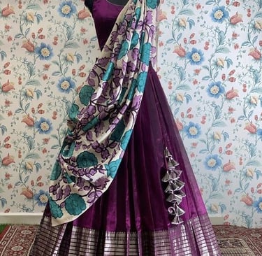 a purple and blue dress with a floral print on the bottom