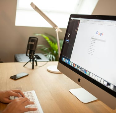 Google Ads someone typing on a computer screen Google