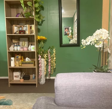 Reception area of Ashburton Thai Massage & Spa featuring a welcoming desk, comfortable seating, and