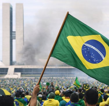 a man holding a flag in front of a crowd of people