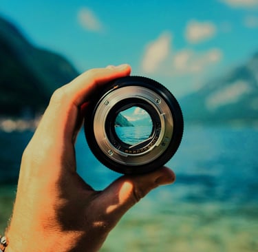Camera lens focused on blue water, symbolizing Buckeye Venture Group’s real estate vision
