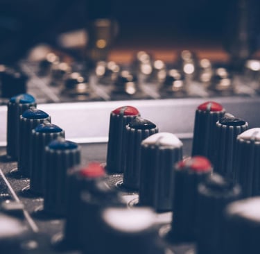 a sound mixing console with a sound board