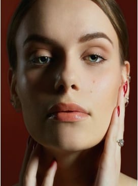 women with facial and cosmetic application