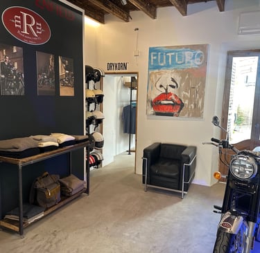 a motorcycle parked in a garage with a motorcycle