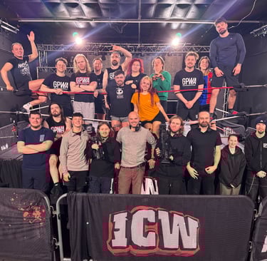 a group of students at a wrestling ring