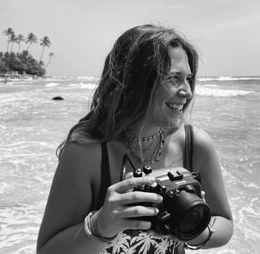 woman beach smiling with camera