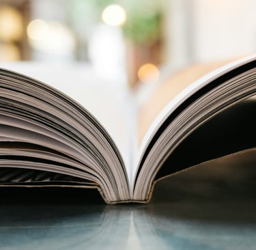 a book opened to show a book with a bookmark