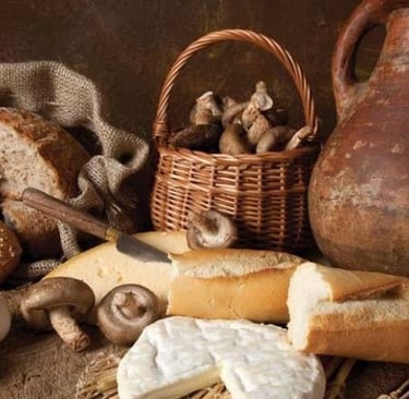 a bunch of breaded bread and bread on a table