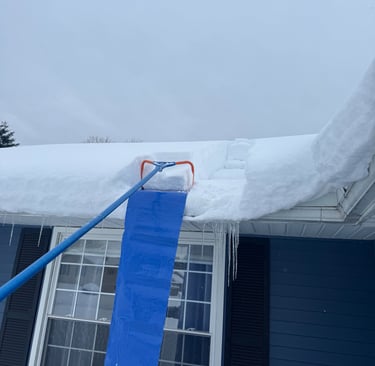 A roof being shoveled