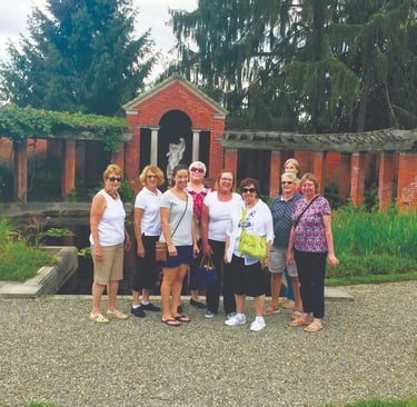a group of people standing in front of a building