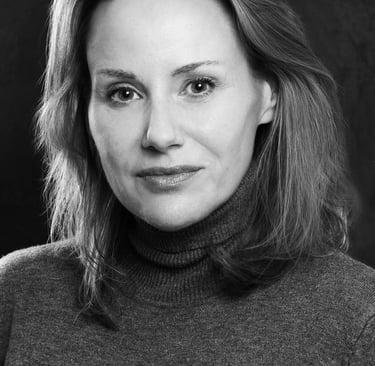a woman in a turtle neck sweater and turtle neck sweater