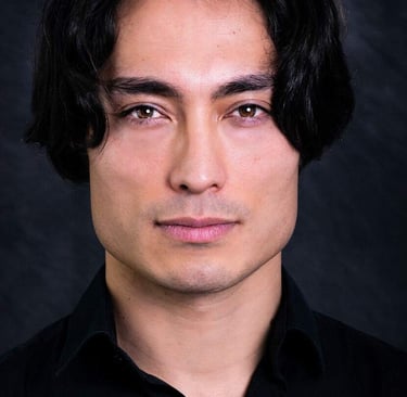 a man with a black shirt and a black shirt