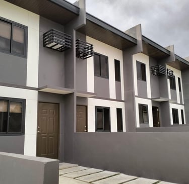 Move-in ready townhouse near SJDM City Hall — modern 2-storey with bedroom, garage, and balcony."