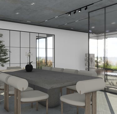 Large concrete dining table and modern chairs with light upholstery illuminated by track lighting