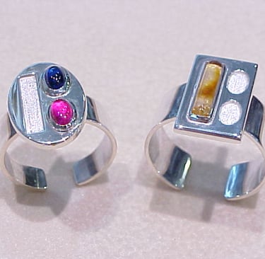 Juego de anillos encastrables fabicados en plata con piedras naturales