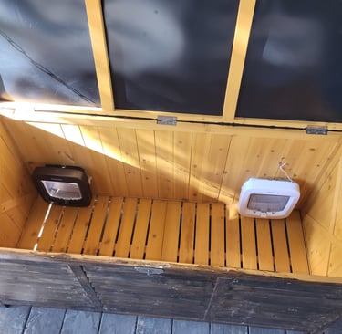 Different inside view of feeding box without floor cover.