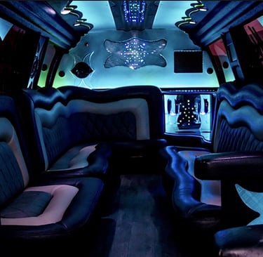 a bus with a lot of seats and a laptop
