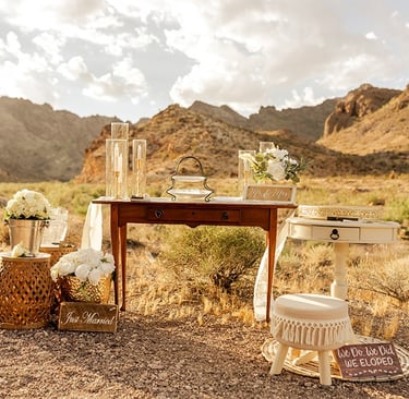 a table with a table set up for a wedding