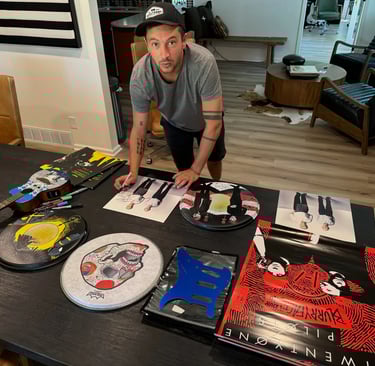 Tyler Joseph signing items for charity event 2023