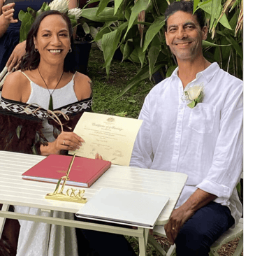 Image of Lana and Danny Weller, during their wedding, after the official paperwork signing