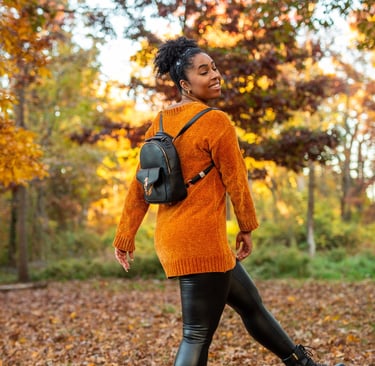 Alexandria VA and Fort Washington MD Family Photographer and picture of women in orange sweater. s