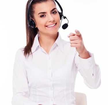 a woman in a white shirt and headphones
