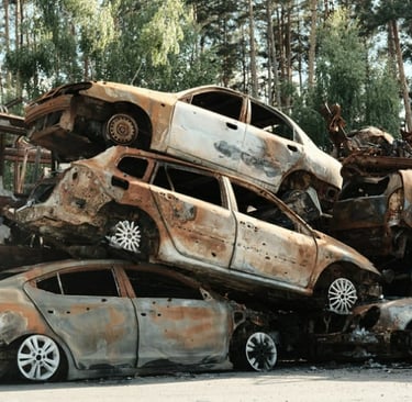 A pile of cars that are sitting on top of each other