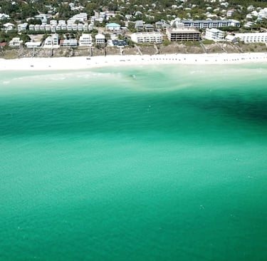 a beach with a boat in the water