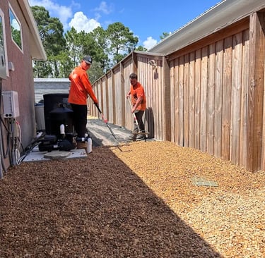 coastal creations landscaping team working in client yard