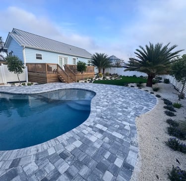 a pool with a deck and a deck with a deck