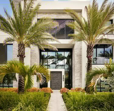 a house with a large front yard and a walkway