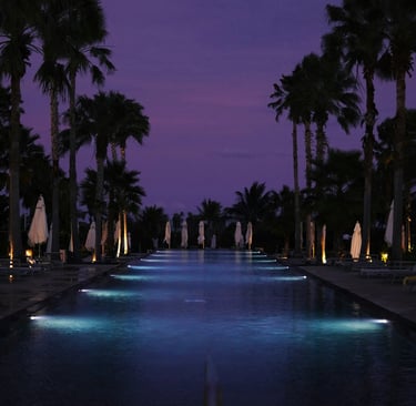 pool with low voltage lights at dusk