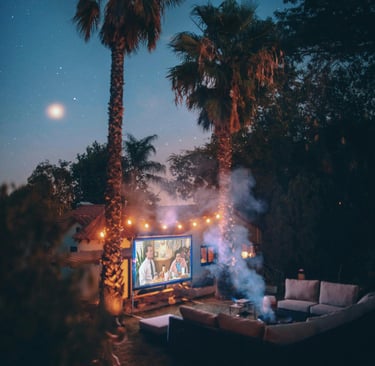 a couch with a tv screen in the middle of a night