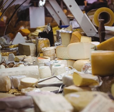 Variety of cheese at counter