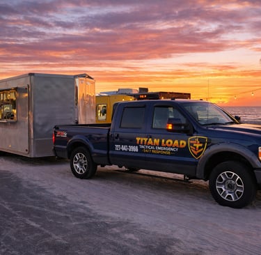 Titan Load hauling a food truck trailer with Ford F-250 service truck in St. Petersburg Florida