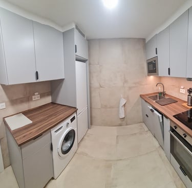 Fully equipped kitchen with washing machine and oven, Anne apartment San Sebastian