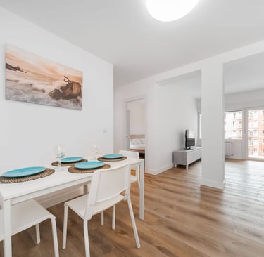 Spacious open-plan living and dining area with balcony, Anne apartment San Sebastian
