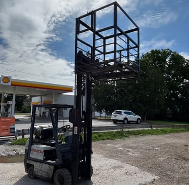 dcw budget 4x4 man basket work platform  being raised by fork lift